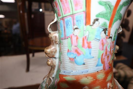 A 19th century Chinese famille rose baluster vase (chip to rim)